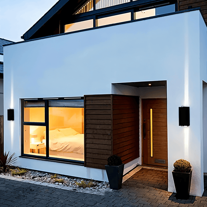 Lampe murale LED étanche pour façade, résiste aux intempéries, offrant un éclairage extérieur durable.