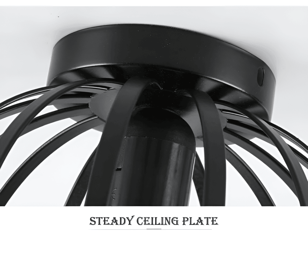 Détail du plafonnier géométrique en fer noir, un luminaire design moderne qui apporte du style à l'intérieur.