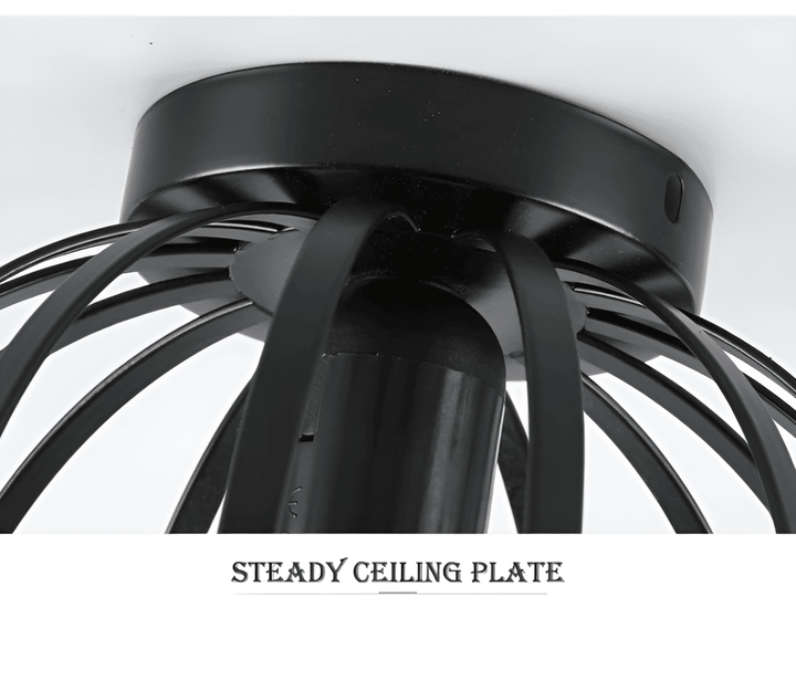 Détail du plafonnier géométrique en fer noir, un luminaire design moderne qui apporte du style à l'intérieur.