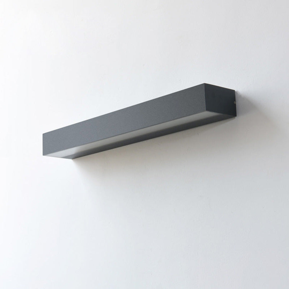 Applique murale LED étanche, vue latérale. Design moderne pour éclairage extérieur de jardin et allée.