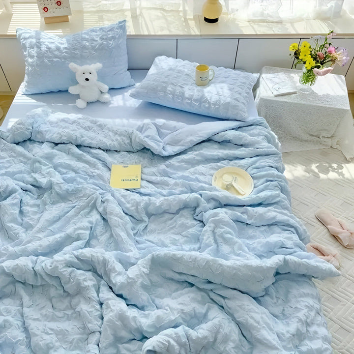 Plaid d'été respirant et doux, idéal pour des nuits confortables. Parfait pour lit ou jeté de canapé.