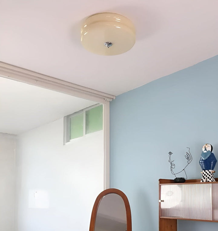 Plafonnier LED vintage rond, finition crème, ambiance chaleureuse style Bauhaus. Idéal salon.
