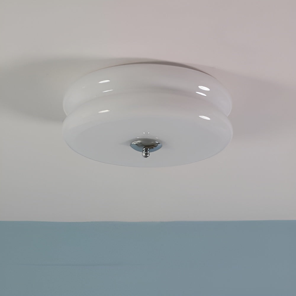 Plafonnier LED rond crème, ambiance Bauhaus, lumière chaude et design élégant pour la maison.