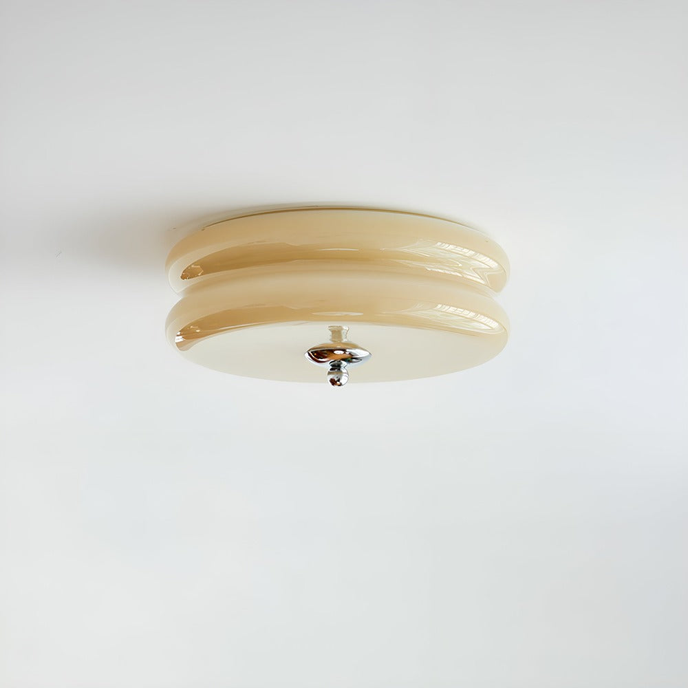 Design Bauhaus crème pour ce plafonnier LED rond, éclairage doux et moderne.