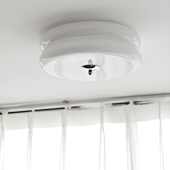 Plafonnier LED rond crème, design Bauhaus, éclairage moderne pour une ambiance chaude et chic.