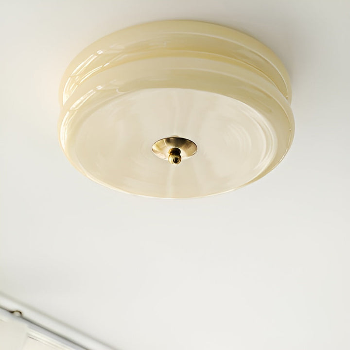 Éclairage LED de plafond rond crème, design élégant, touche Bauhaus moderne et sobre.