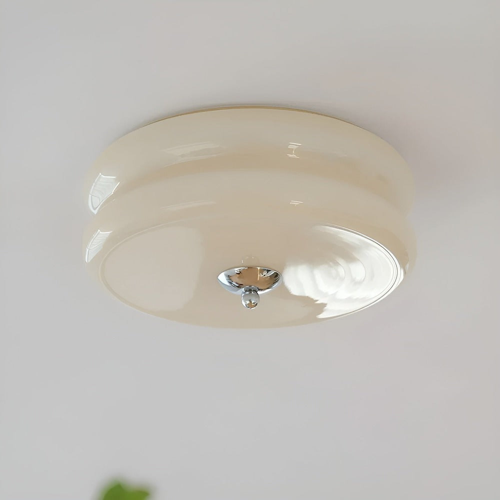 Éclairage de plafond LED crème, design élégant et rond, esprit Bauhaus pour intérieur moderne.