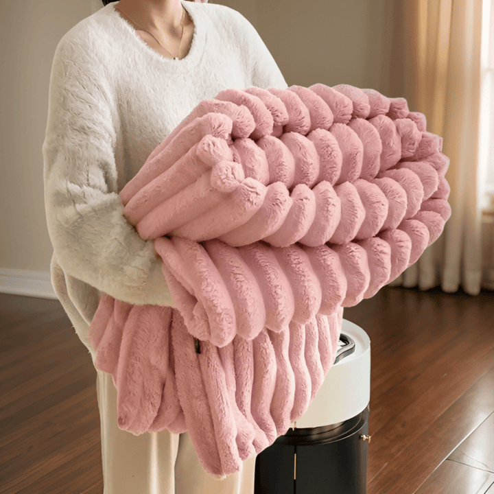Une couverture polaire douillette, chaude et douce, essentielle pour le confort de votre maison tout au long de l'année.