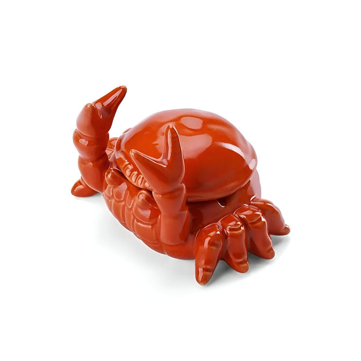 Cendrier d'intérieur orange en forme de crabe, élégant et pratique, idéal pour les fumeurs.