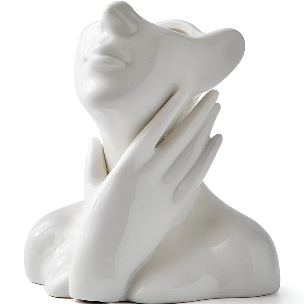 Offrez ce vase artistique à visage humain, un cadeau moderne et élégant pour tout amateur de design.