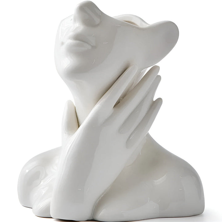 Offrez ce vase artistique à visage humain, un cadeau moderne et élégant pour tout amateur de design.