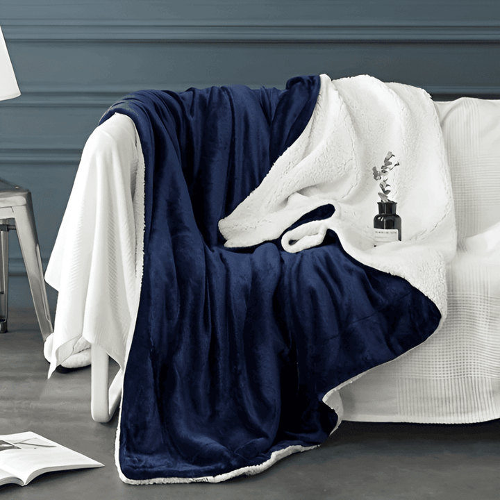 Plaid chaud et douillet en polaire Sherpa épais pour canapé. Confort hivernal réversible, parfait pour la détente.