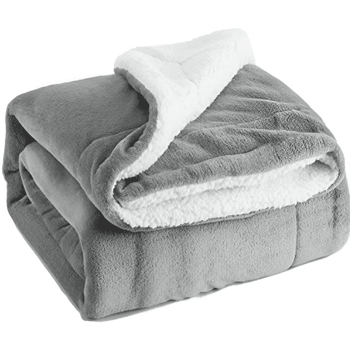 Plaid très chaud en polaire Sherpa épais et moelleux. Couverture douillette réversible pour un hiver confortable et décoratif.