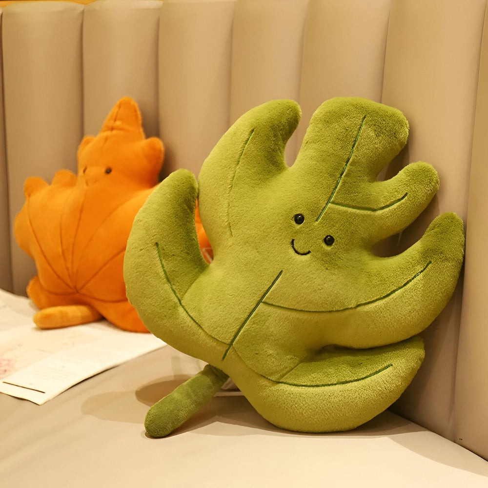 Coussin décoratif nature, feuille de velours doux, pour une touche de verdure et de confort au salon.