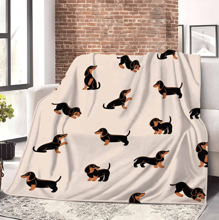 Couverture plaid polaire douce avec motif teckel. Parfaite pour le salon, la maison ou comme cadeau chaleureux.