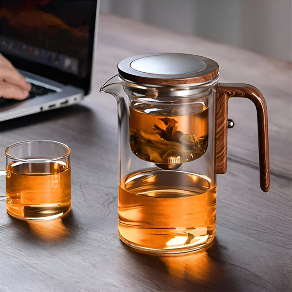 Théière en verre résistante à la chaleur, design épuré, idéale pour bureau et boissons chaudes.