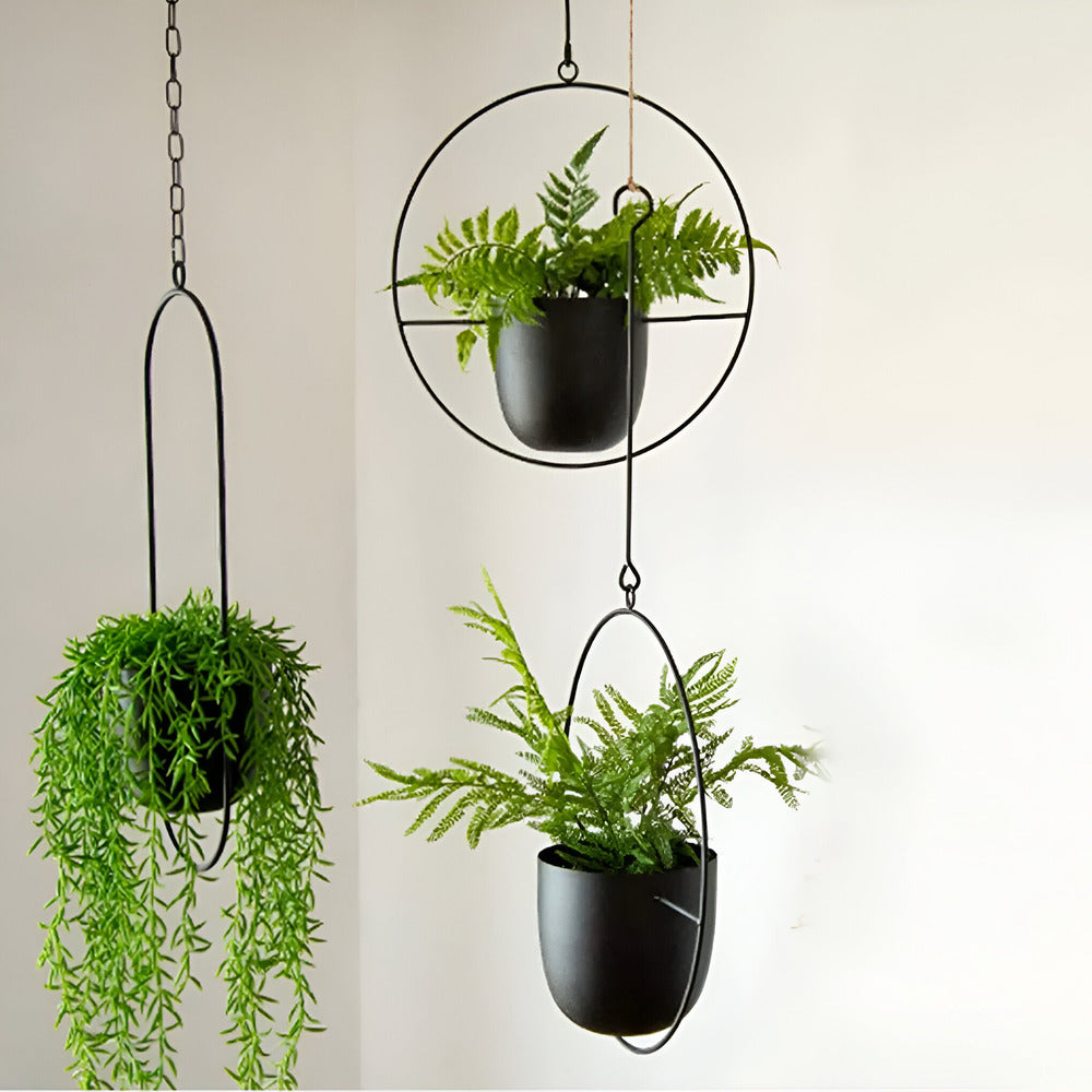 Pot de fleurs suspendu minimaliste blanc, idéal pour décoration intérieure moderne et élégante.