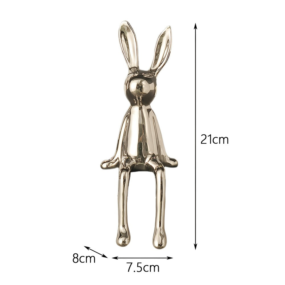 Superbe statue de lapin en céramique brillante. Ornement de qualité pour sublimer votre décoration.