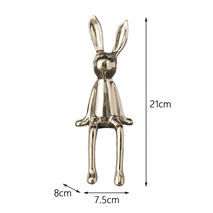 Superbe statue de lapin en céramique brillante. Ornement de qualité pour sublimer votre décoration.