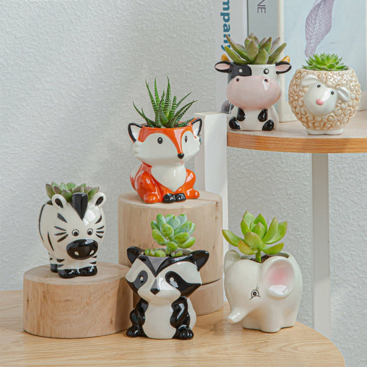 Petit pot de succulente animal en céramique, design ludique renard orange. Idéal pour plante d'intérieur.