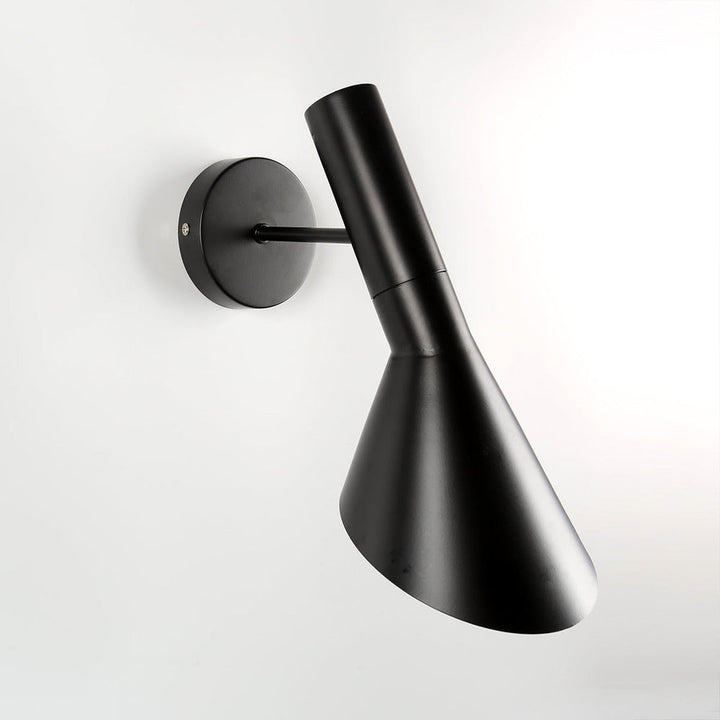 Éclairage intérieur LED blanc, mural et ajustable, pour créer une ambiance chaleureuse dans la chambre.