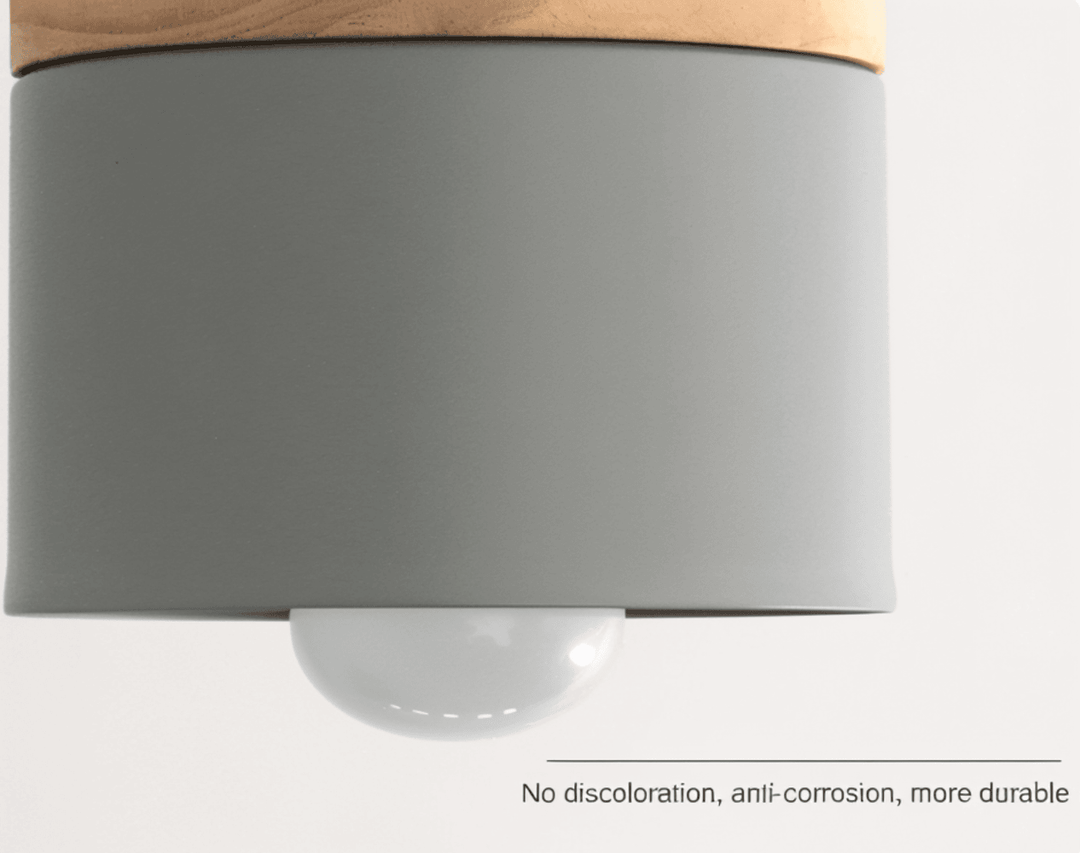 Détail de la suspension cylindrique moderne, finition élégante et design épuré.