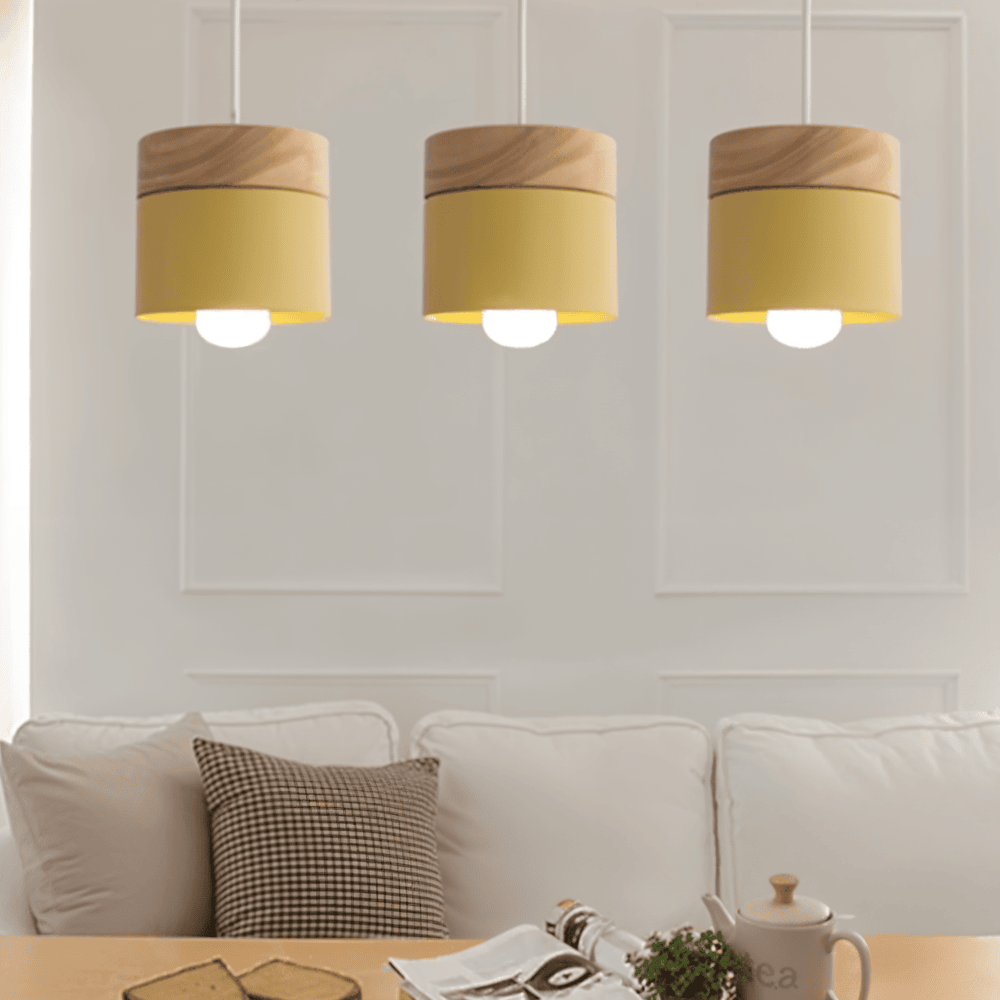 Suspension design cylindrique pour cuisine, éclairage fonctionnel et esthétique scandinave.