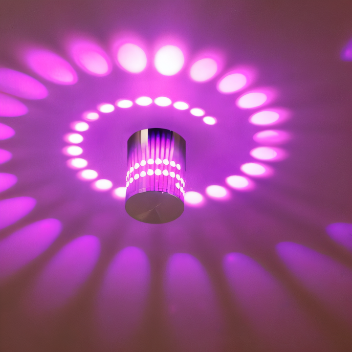 Lampe LED murale design, cylindre à spirale lumineuse, crée une ambiance unique et chic.
