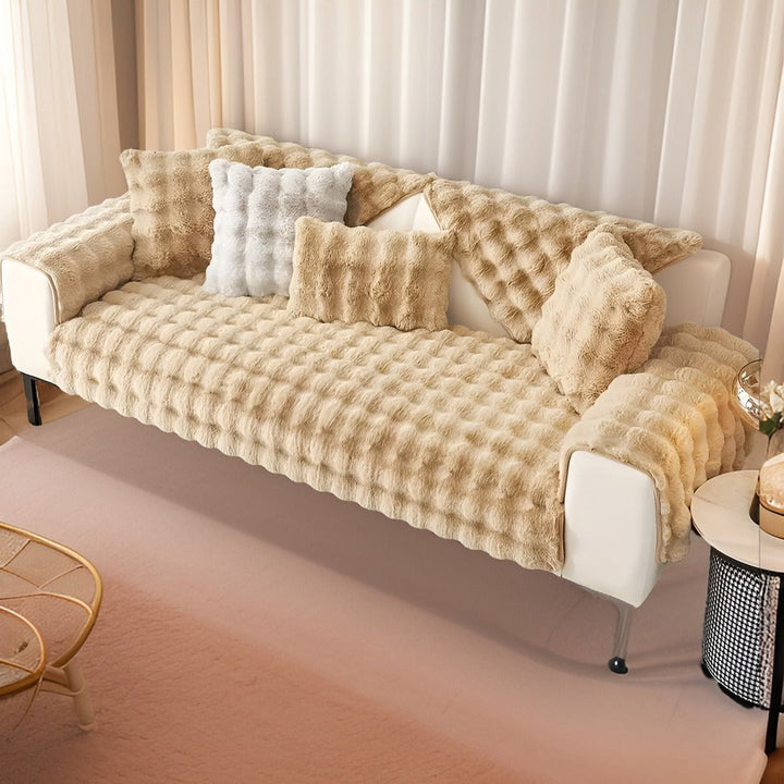 Plaid canapé en peluche ultra-douce, pour une décoration chaleureuse et un confort supérieur dans le salon.