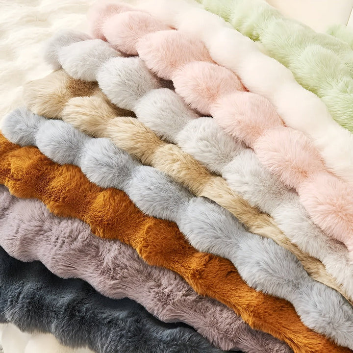 Couverture canapé en peluche lavable, offrant douceur, protection et entretien facile pour votre mobilier.