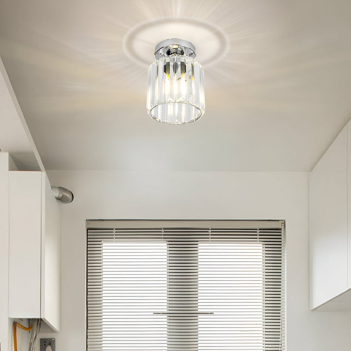 Plafonnier LED Crystalon pour salon, design moderne et ambiance chaleureuse.