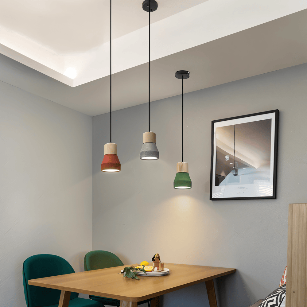 Suspension élégante, luminaire design moderne pour salle à manger spacieuse et chic.