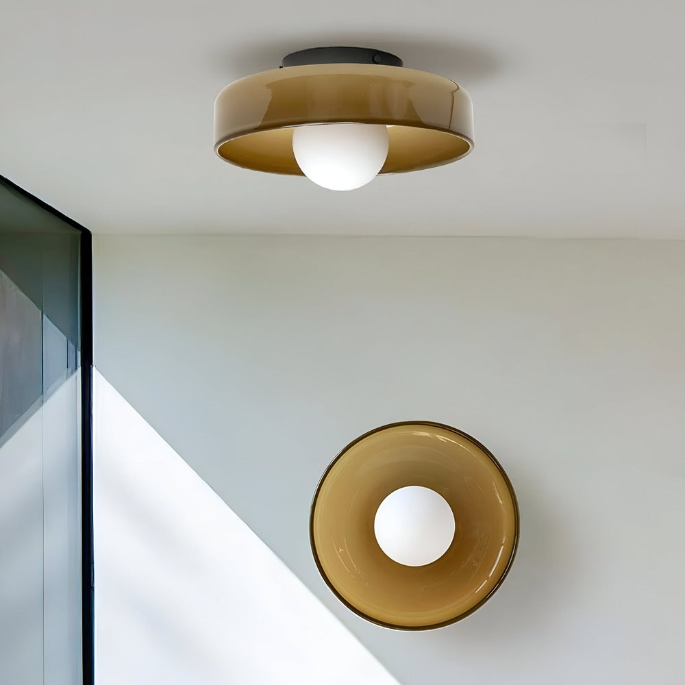Plafonnier Nordic OrangeBeam pour salon, design moderne et lumière chaleureuse.
