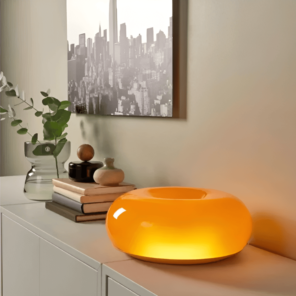 Lampe de table Donut nordique en verre orange, design moderne pour intérieur chic.