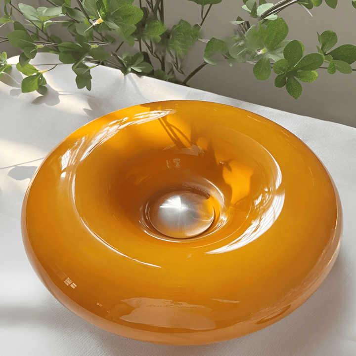 Lampe de bureau Donut en verre orange chic, touche moderne pour votre espace de travail.