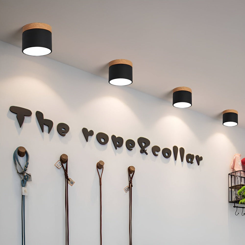 Lampe murale LED cylindrique PastelGlow, design contemporain, diffuse une lumière d'ambiance douce.