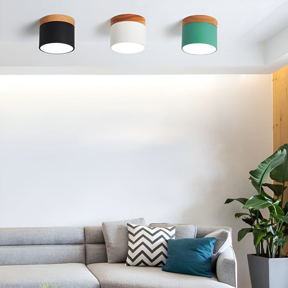 Lampe cylindrique LED intégrée PastelGlow, applique moderne pour un éclairage intérieur raffiné.