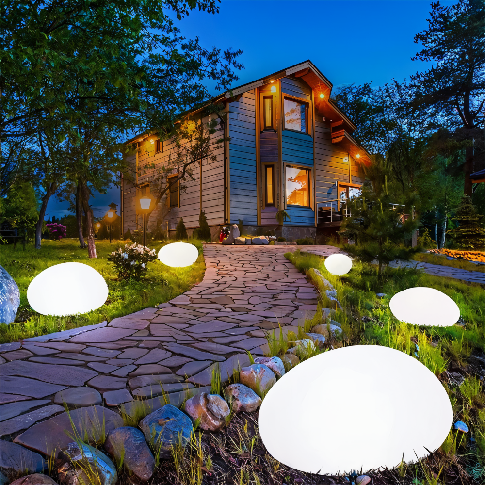 Luminaire extérieur solaire LED, design pierre, résistant intempéries pour jardin.