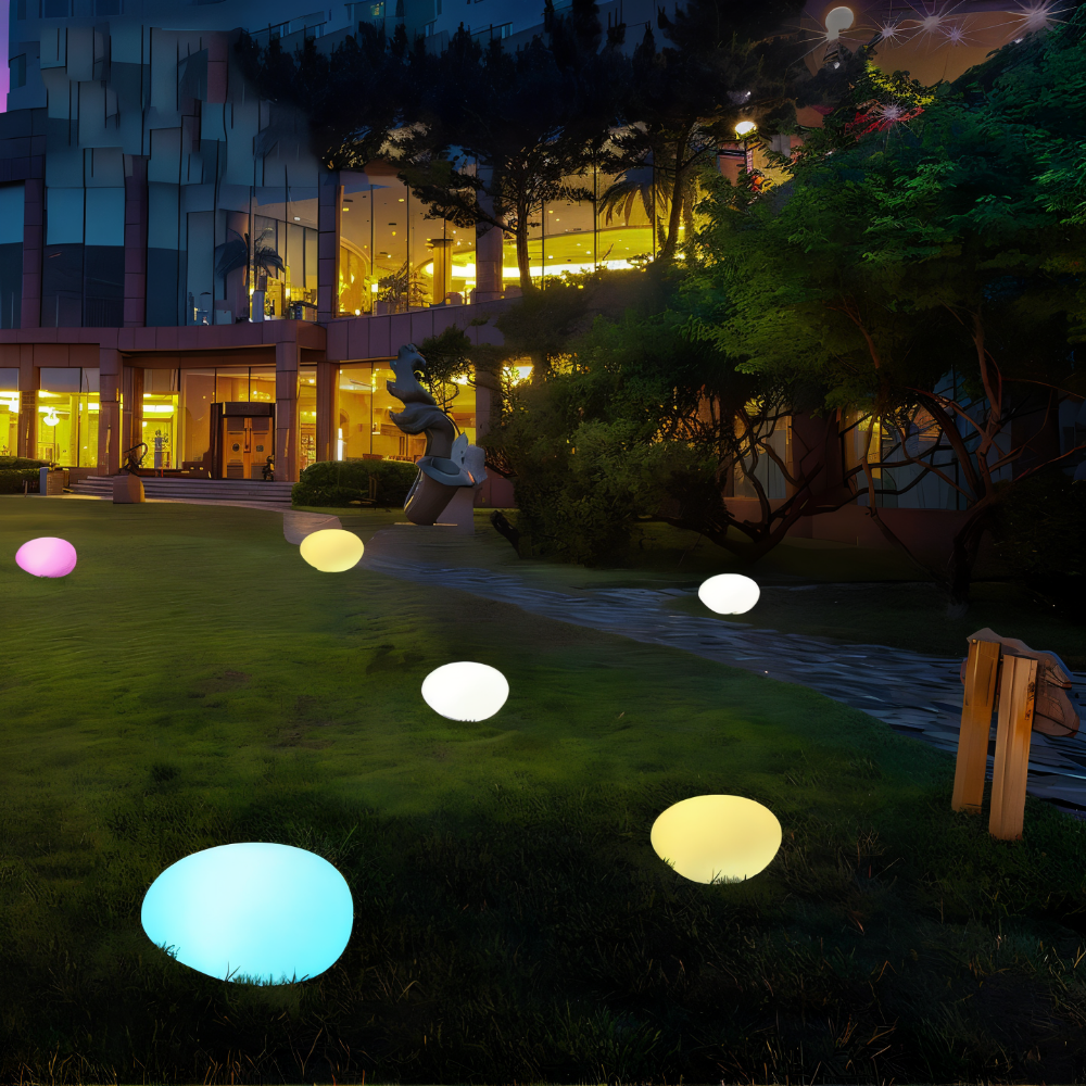 Lampe solaire LED pour jardin, design pierre naturelle, étanche et robuste.