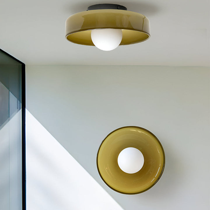 Luminaire plafond LED rond pour salon contemporain, lumière douce et uniforme.