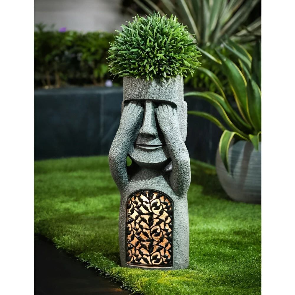 Ambiance lumineuse avec figurine Moai solaire, statue extérieure en résine pour jardin, terrasse ou balcon.