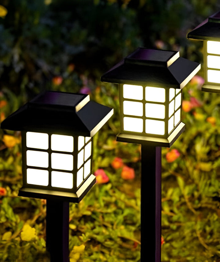 Éclairage de jardin LED solaire blanc chaud, design moderne, autonome et résistant aux intempéries.
