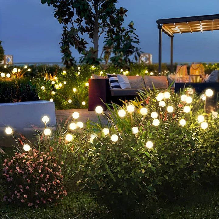 Lot de lampes solaires lucioles pour une décoration de jardin scintillante et un éclairage extérieur.