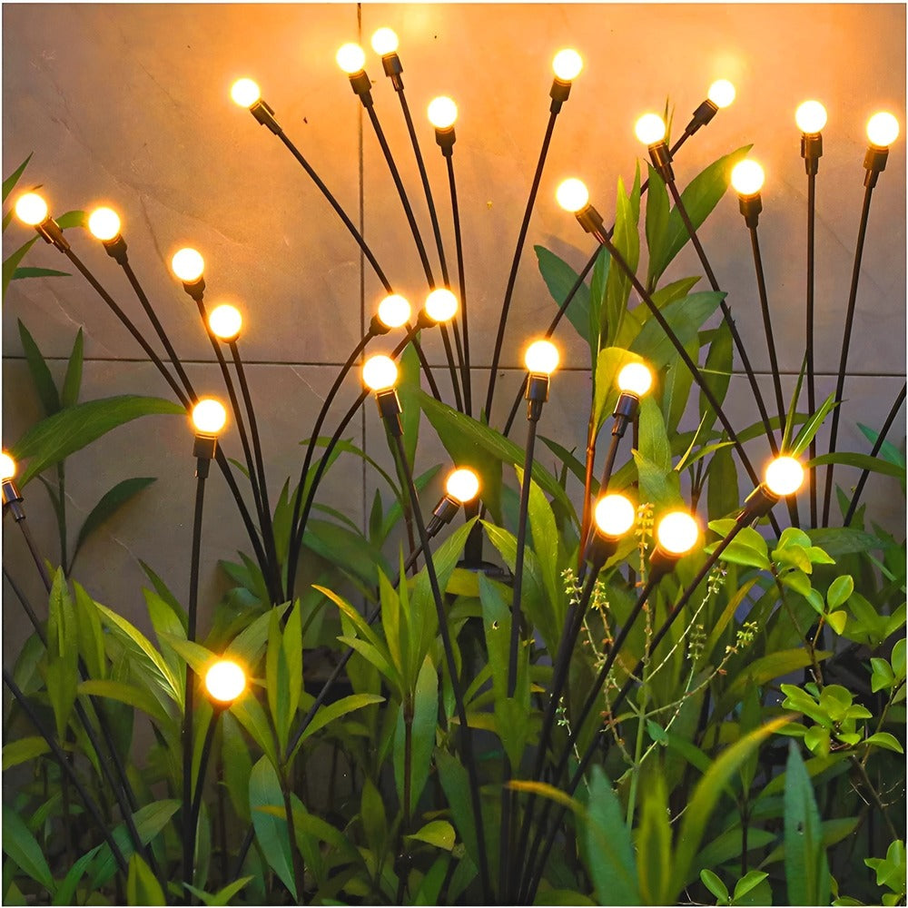 Éclairage extérieur LED solaire, lucioles flottantes apportant une lumière douce au jardin.