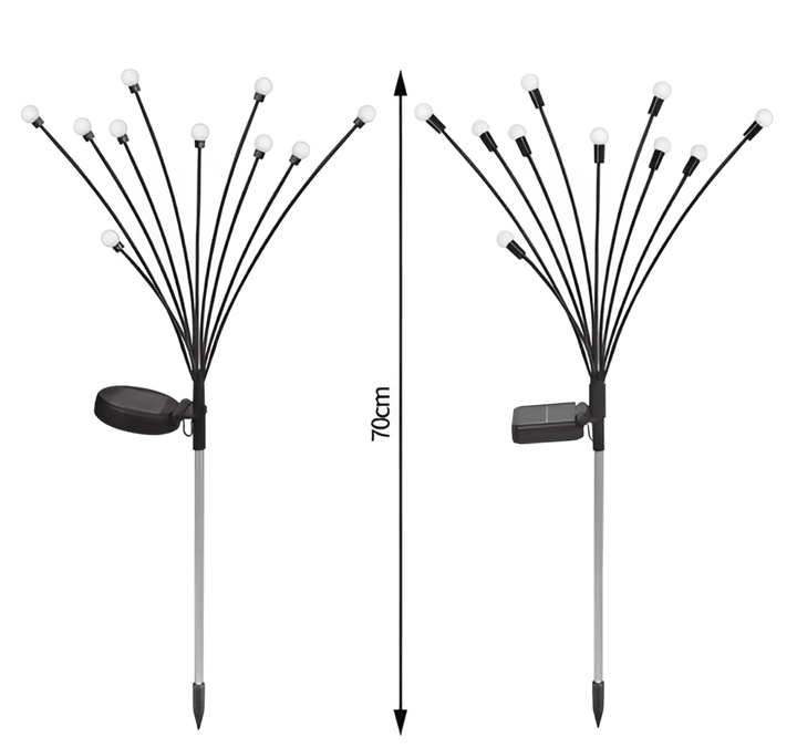 Chemin de jardin éclairé par des lampes solaires lucioles, sécurité et esthétique la nuit.
