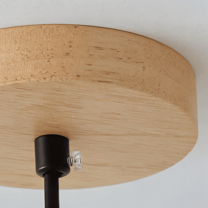Plafonnier cylindrique contemporain, enrichit l'éclairage et la décoration d'un salon ou d'une chambre moderne.