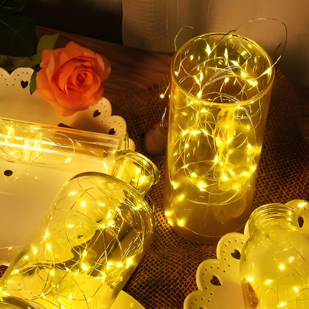 Guirlande solaire LED extérieure, ambiance lumineuse chaleureuse pour vos soirées estivales.