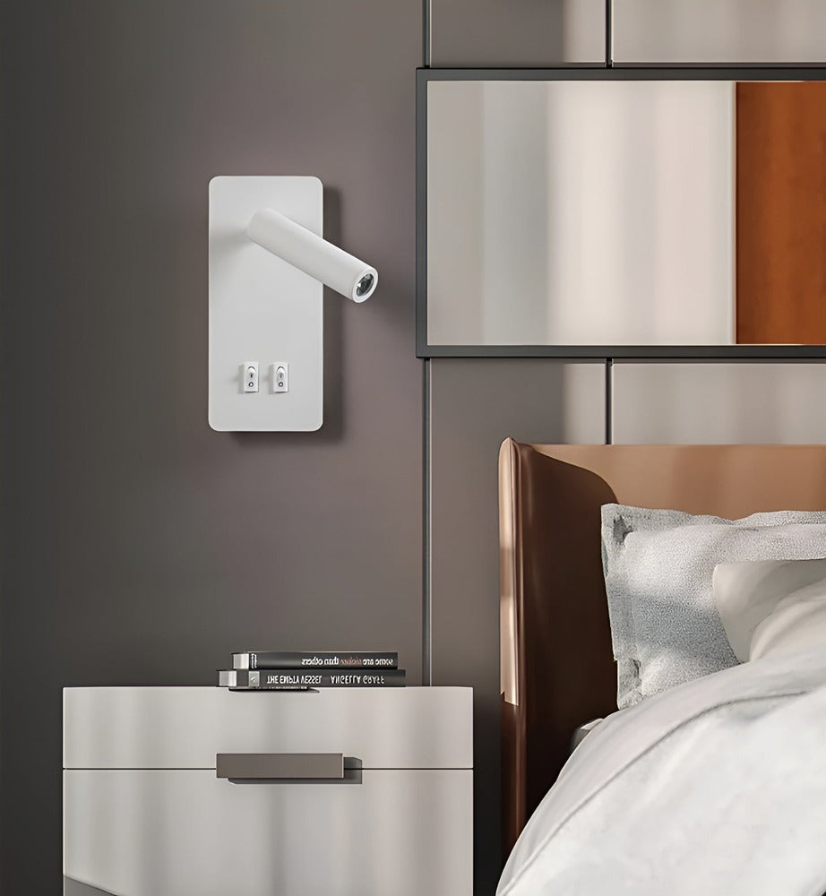 Lampe murale LED rotative cylindrique blanche, design épuré, idéale pour un éclairage de lecture directionnel.