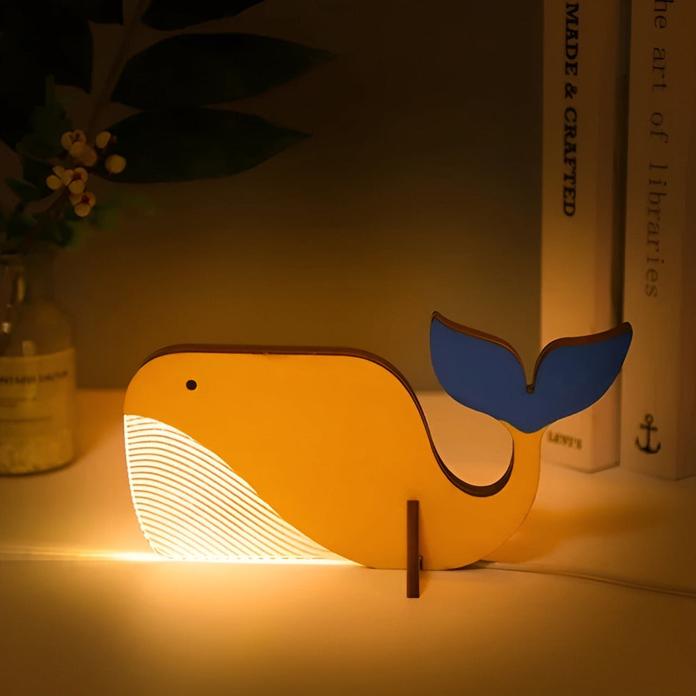 Veilleuse LED apaisante pour chambre d'enfant, forme animale, base en bois et corps acrylique lumineux.