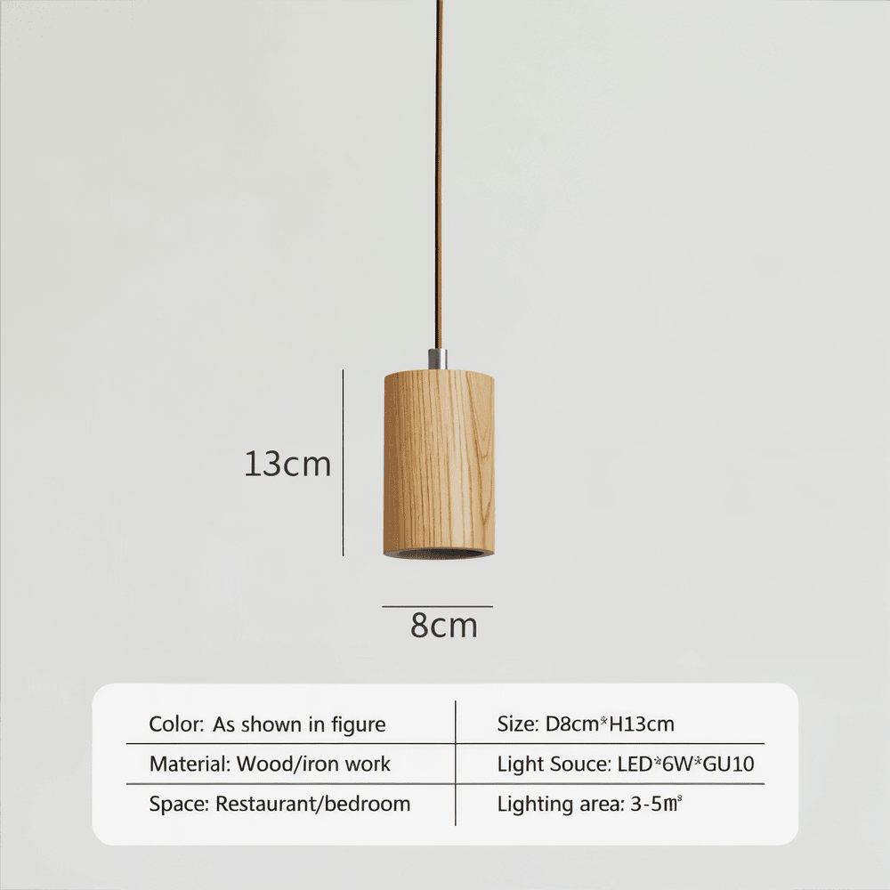 Lampe à suspension cylindrique métallique noire, un élément design pour votre déco intérieure moderne.